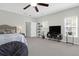 Bright bedroom with ample space, ceiling fan, and built-in shelving at 794 Hunt Club Run, Charleston, SC 29414