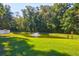 Community pond with fountain and lush green landscaping at 794 Hunt Club Run, Charleston, SC 29414