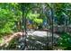 Secluded backyard patio with fire pit and seating area at 794 Hunt Club Run, Charleston, SC 29414