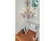 Elegant foyer with hardwood floors and a grand chandelier at 794 Hunt Club Run, Charleston, SC 29414