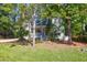 Two-story green house with white trim and porch at 794 Hunt Club Run, Charleston, SC 29414