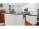 White kitchen with stainless steel appliances and dark countertops at 794 Hunt Club Run, Charleston, SC 29414