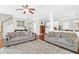 Open living room with hardwood floors, comfortable seating, and views of kitchen at 794 Hunt Club Run, Charleston, SC 29414
