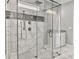Large bathroom with a walk-in shower and marble flooring at 4566 Durant Ave, North Charleston, SC 29405