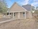 Newly built home with front porch and landscaping at 4566 Durant Ave, North Charleston, SC 29405