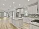 Open concept kitchen with island and stainless steel appliances at 4566 Durant Ave, North Charleston, SC 29405