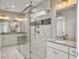 Elegant bathroom with double vanities and a large glass shower at 4566 Durant Ave, North Charleston, SC 29405