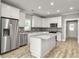 Modern kitchen with stainless steel appliances and granite island at 4566 Durant Ave, North Charleston, SC 29405