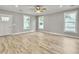 Spacious living room featuring hardwood floors and multiple windows at 4566 Durant Ave, North Charleston, SC 29405