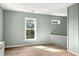 Spacious bedroom with light walls and large window at 1008 Mariners Cay Dr, Folly Beach, SC 29439