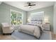 Bright bedroom with window seating and coastal decor at 1008 Mariners Cay Dr, Folly Beach, SC 29439