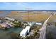 Aerial view showing house location by waterway at 1008 Mariners Cay Dr, Folly Beach, SC 29439