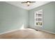 Bright bedroom with large window and hardwood floors at 1008 Mariners Cay Dr, Folly Beach, SC 29439