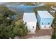 Two-story homes with metal roofs near waterfront at 1008 Mariners Cay Dr, Folly Beach, SC 29439
