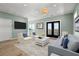 Living room with comfy furniture and access to a deck at 1008 Mariners Cay Dr, Folly Beach, SC 29439