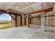 Unfinished basement space with concrete floor and natural light at 1008 Mariners Cay Dr, Folly Beach, SC 29439