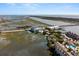 Aerial view showing community features, including waterfront access and pool at 1008 Mariners Cay Dr, Folly Beach, SC 29439