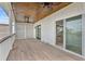 Spacious deck with wood flooring, ceiling fans, and access to interior at 1008 Mariners Cay Dr, Folly Beach, SC 29439