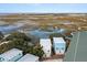Aerial view of two-story house near marsh at 1008 Mariners Cay Dr, Folly Beach, SC 29439