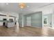 Modern kitchen with white cabinets and gray island at 1008 Mariners Cay Dr, Folly Beach, SC 29439