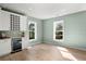 Bright dining room with white cabinets and wine cooler at 1008 Mariners Cay Dr, Folly Beach, SC 29439