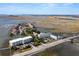 Wide aerial view of waterfront property at 1008 Mariners Cay Dr, Folly Beach, SC 29439