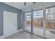 Screened porch with access door and view of backyard at 1713 Sparkleberry Ln, Johns Island, SC 29455