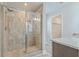 Bathroom with a tiled shower and granite countertop at 1713 Sparkleberry Ln, Johns Island, SC 29455