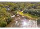 Aerial view of waterfront homes and properties with lush green landscaping at 5250 Timber Race Crse, Hollywood, SC 29449