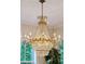 Elegant crystal chandelier illuminates a bright dining space at 5250 Timber Race Crse, Hollywood, SC 29449