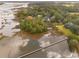 Aerial view of waterfront community with marsh and homes at 5250 Timber Race Crse, Hollywood, SC 29449