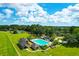 Community pool and tennis courts in a lush green setting at 5250 Timber Race Crse, Hollywood, SC 29449