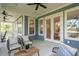 Spacious screened porch with access to the home's interior, furnished for comfortable living at 5250 Timber Race Crse, Hollywood, SC 29449