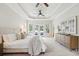 Spacious bedroom with a king-size bed, dresser, and access to a private balcony at 5250 Timber Race Crse, Hollywood, SC 29449