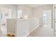 Upstairs hallway with access to bedrooms and laundry room at 5250 Timber Race Crse, Hollywood, SC 29449