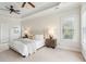 Bright bedroom with a king-size bed and plenty of natural light at 5250 Timber Race Crse, Hollywood, SC 29449