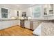 Modern kitchen with granite counters and stainless steel appliances at 5250 Timber Race Crse, Hollywood, SC 29449