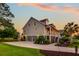 Rear view of home showcasing a large, screened porch at 2873 Maritime Forest Dr, Johns Island, SC 29455