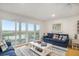 Relaxing living room with water views and comfortable seating at 93 Mariners Cay Drive, Folly Beach, SC 29439