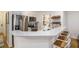 Modern kitchen with stainless steel appliances and white cabinets at 93 Mariners Cay Drive, Folly Beach, SC 29439