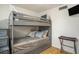 Bedroom with a built-in bunk bed and extra storage at 93 Mariners Cay Drive, Folly Beach, SC 29439