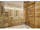 Bathroom with a walk-in shower and wood-like tile at 93 Mariners Cay Drive, Folly Beach, SC 29439
