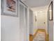 Bright entryway with white louvered closet doors at 93 Mariners Cay Drive, Folly Beach, SC 29439