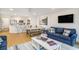 Bright and airy living room with open kitchen and water views at 93 Mariners Cay Drive, Folly Beach, SC 29439