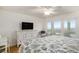 Spacious bedroom with water views and a dresser at 93 Mariners Cay Drive, Folly Beach, SC 29439