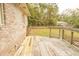 Wooden deck offering views of the backyard and surrounding trees at 15 Cummings Ct, Walterboro, SC 29488