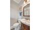 Updated powder room with pedestal sink and patterned floor at 681 Lake Frances Dr, Charleston, SC 29412