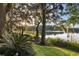 Scenic waterfront property with lush landscaping at 681 Lake Frances Dr, Charleston, SC 29412