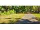 Paved walking path through a wooded area at 141 Kersey Ter, Goose Creek, SC 29445