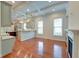 Open-concept kitchen with hardwood floors and a view to a Gathering room at 106 Aviary Ct, Summerville, SC 29483